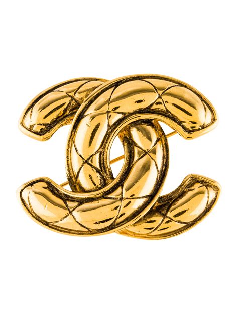 chanel metal quilted cc brooch|Chanel brooches online.